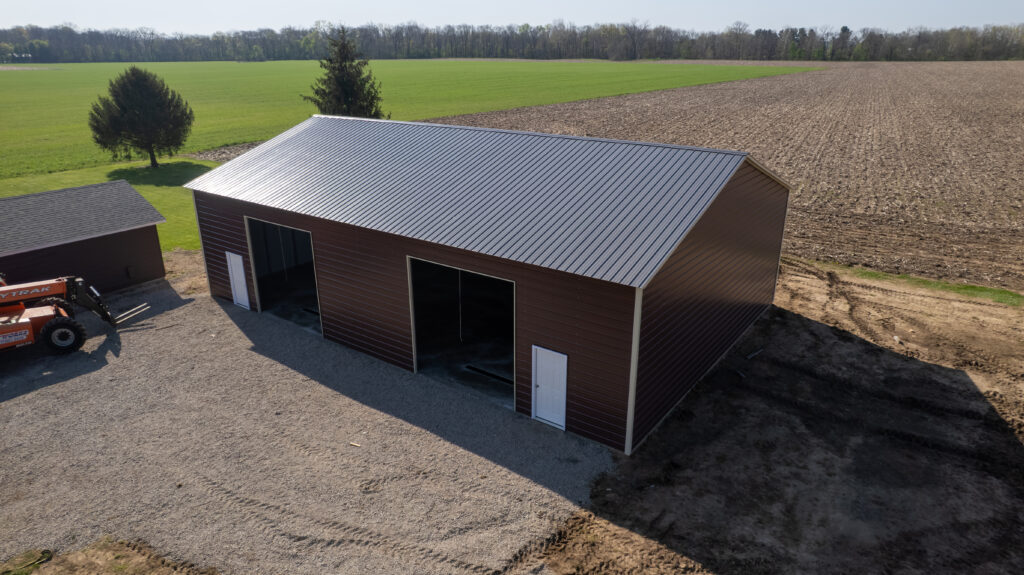 Large metal garage building with multiple vehicle bays